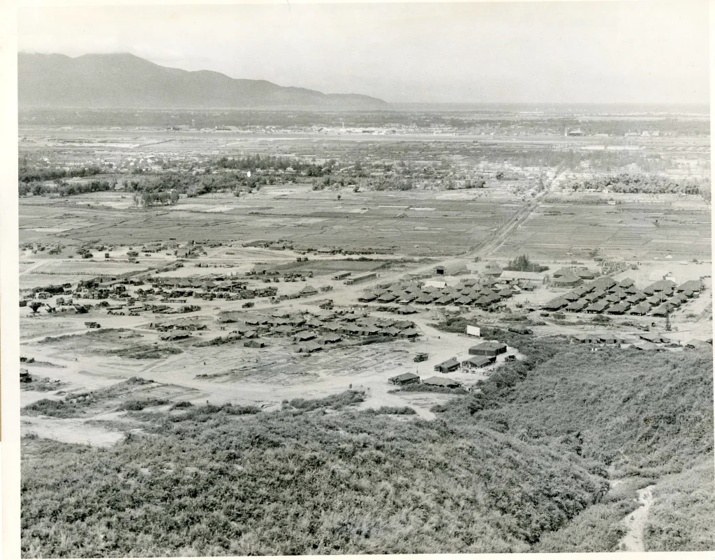Aerial view of the Naval Mobile Construction Battalion (NMCB) 3's camp on Da Nang (Đà Nẵng), Vietnam.