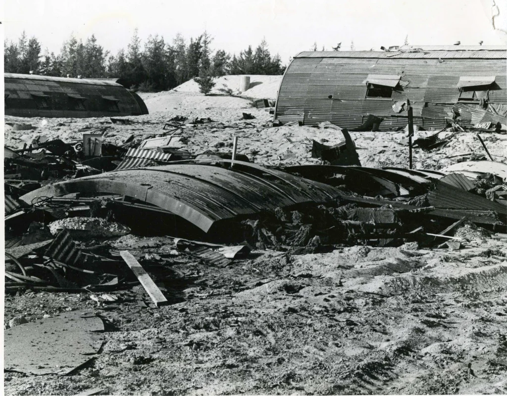 Destruction endured to Naval Quonset huts on Da Nang (Đà Nẵng), Vietnam after a Viet Nam Cong San attack on 28 October, 1965.